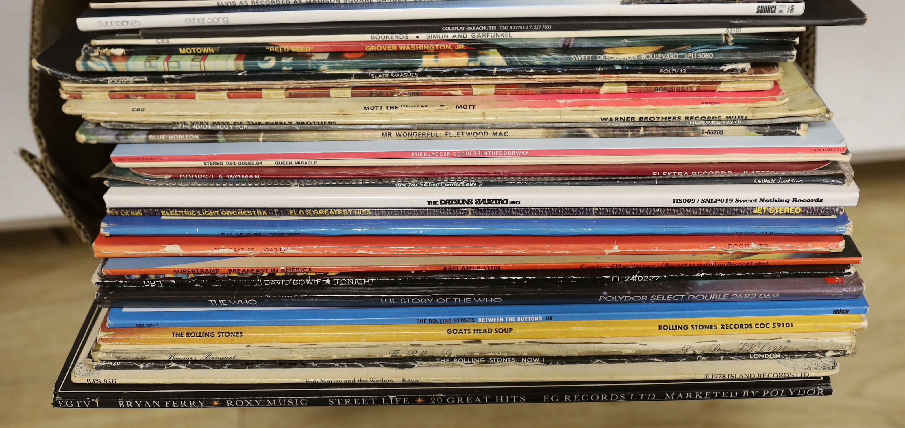 Forty LP record albums by artists including; the Damned, Mike Oldfield, the Rolling Stones, ELO, Supertramp, Jean-Michel Jarre, Rod Stewart, Turin Brakes, Coldplay, Simon & Garfunkel, Stevie Wonder, Mott the Hoople, Iggy